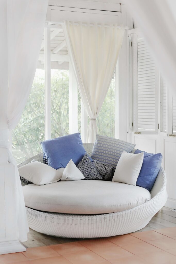 A single rod curtain rod in a Scandinavian-style living room arrangement