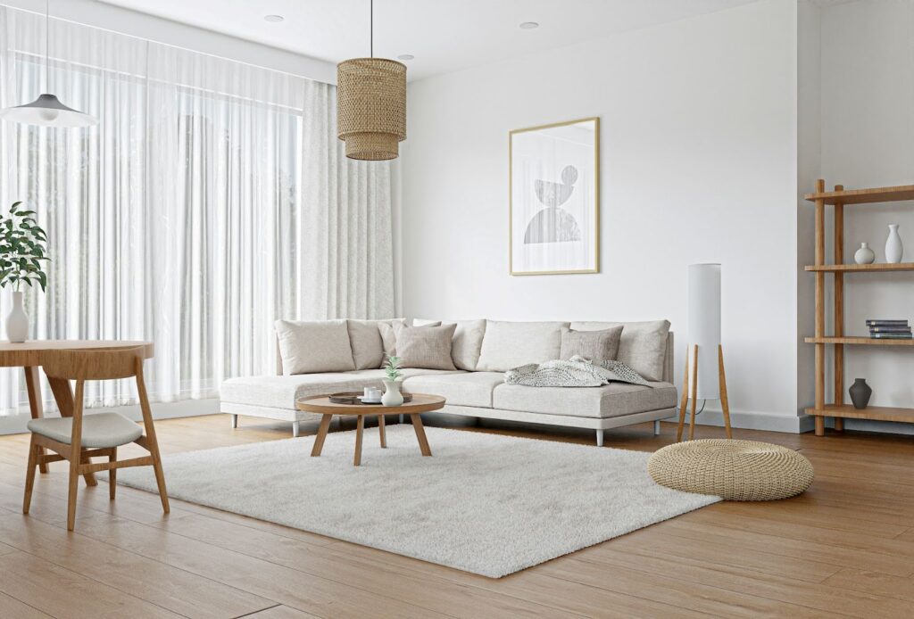 A minimalist Japandi-style interior decorated in cozy, beige colors with the addition of wood